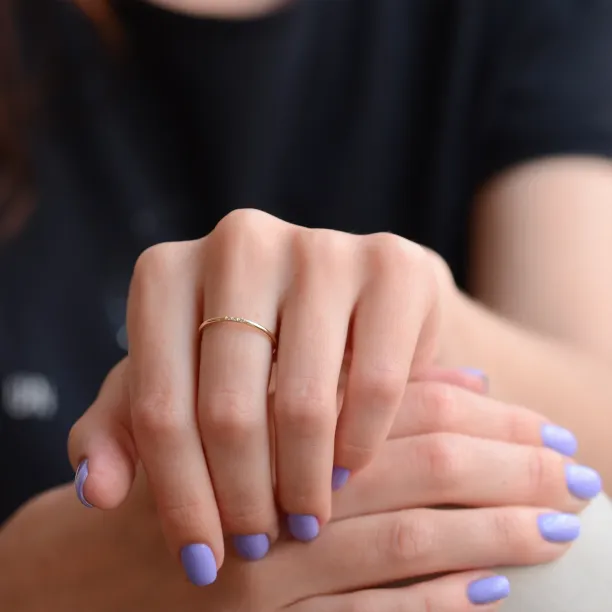 Gold minimalist ring with salt and pepper diamonds OLU Image