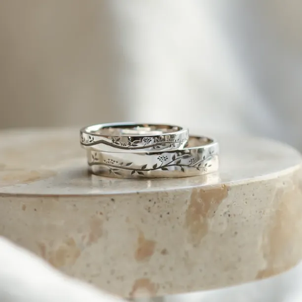 Gold wedding rings with plant motif MIKA Image