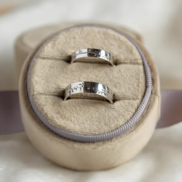 Gold wedding rings with plant motif MIKA Image