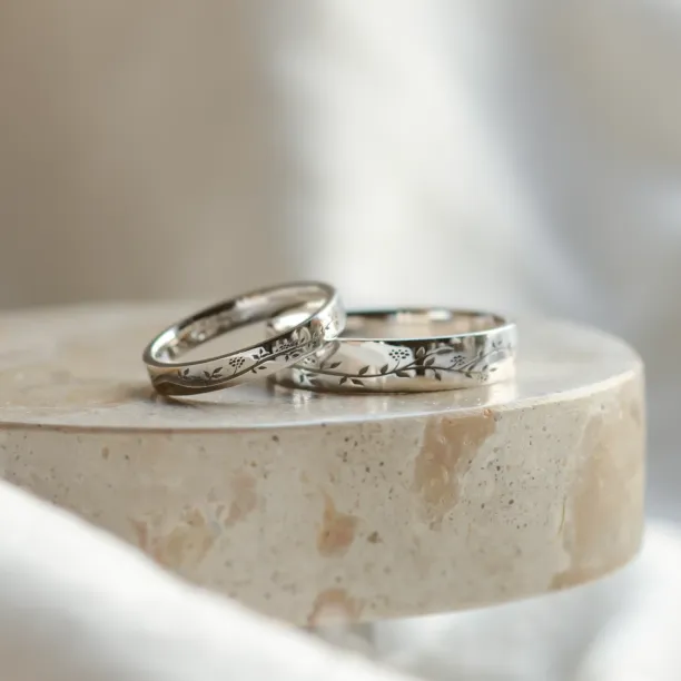 Gold wedding rings with plant motif MIKA Image