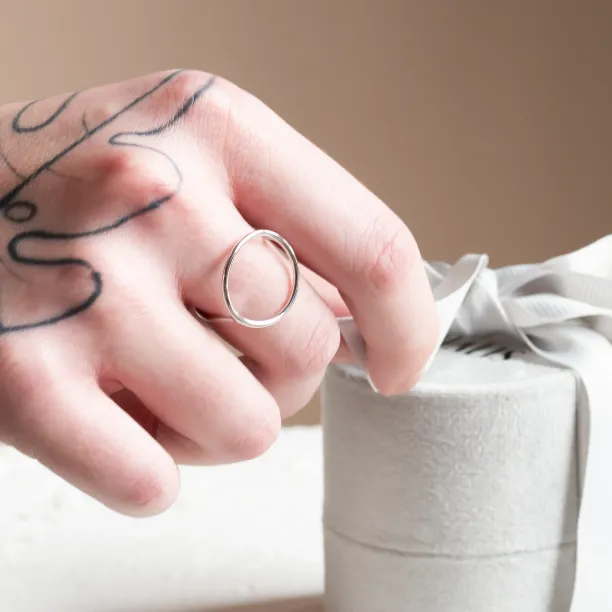 Minimalistic gold ring with the circle NORE Image