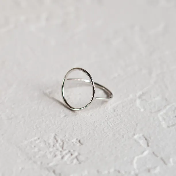 Minimalistic gold ring with the circle NORE Image