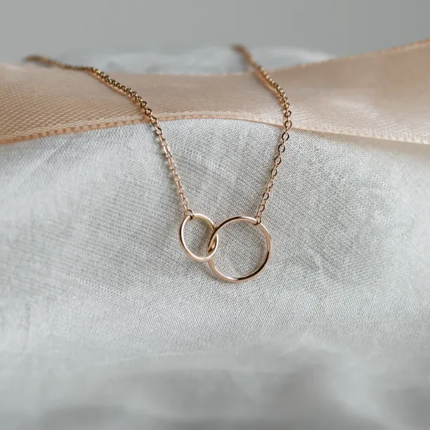 Minimalist gold necklace with rings VOVET Image