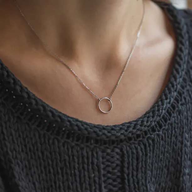 Gold minimalist necklace with a circle KARMA Image