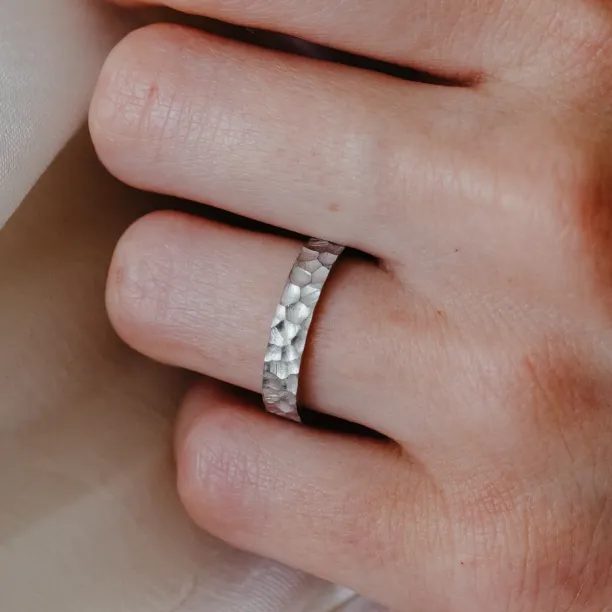 Gold wedding bands with engraved surface PRATO Image