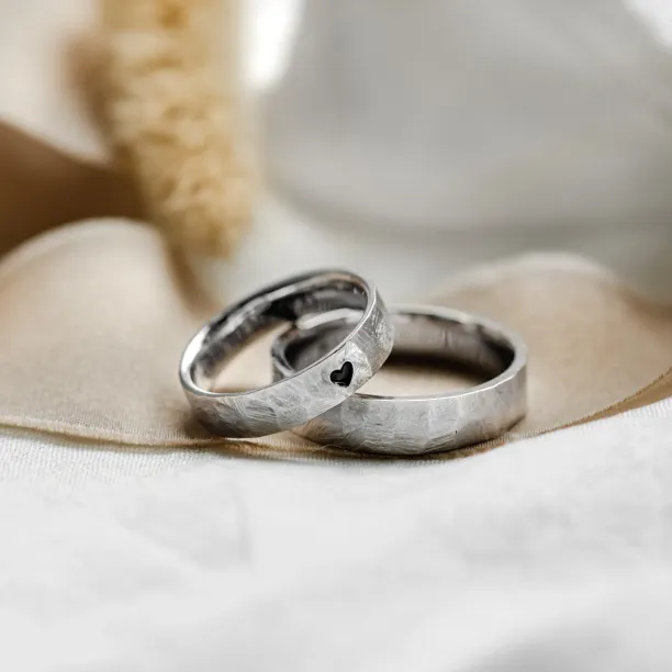Platinum wedding rings with bevelled surface BOMM Image