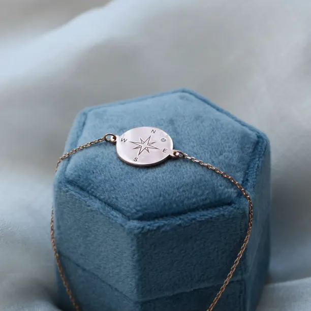 Gold bracelet with a compass and a diamond BOBBIE Image
