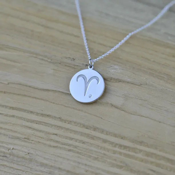 Silver pendant with a sign of zodiac and diamond ZODI Image