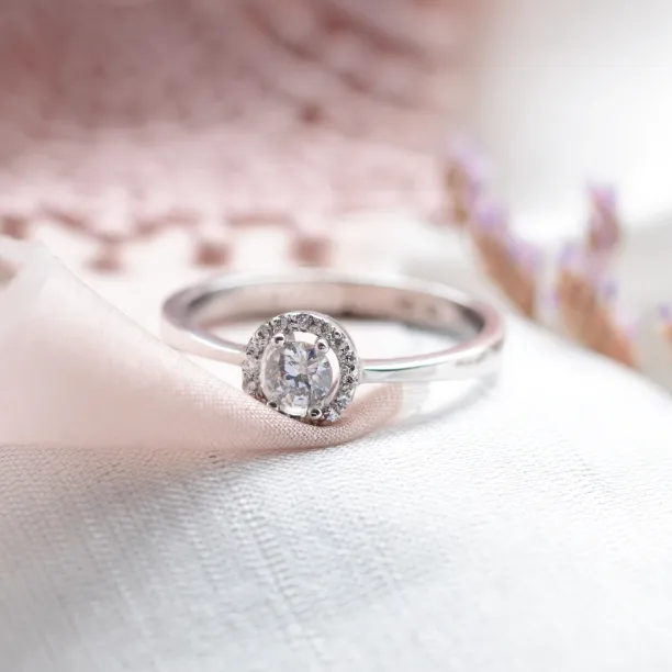 A platinum ring with halo stones and diamonds HALOY Image