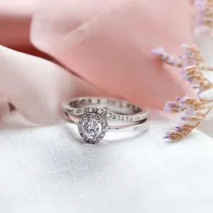 A platinum ring with halo stones and diamonds HALOY Thumbnail