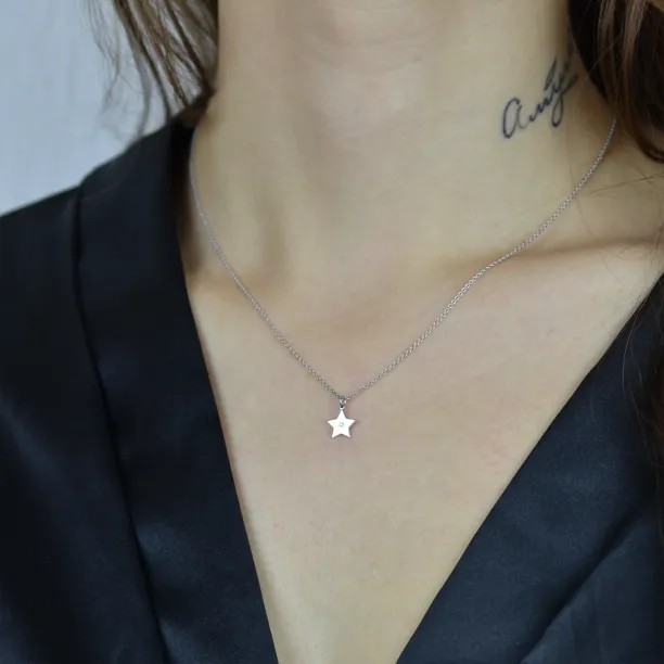VIVIAN gold star pendant with a diamond Image