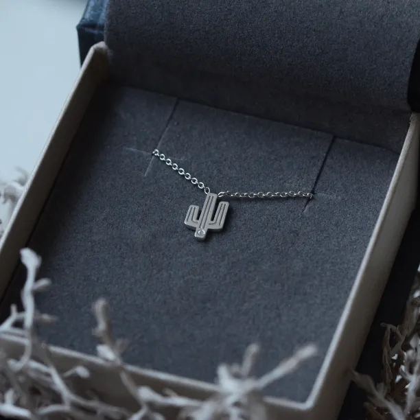 Authentic golden pendant with a cactus shape with TINA diamond Image