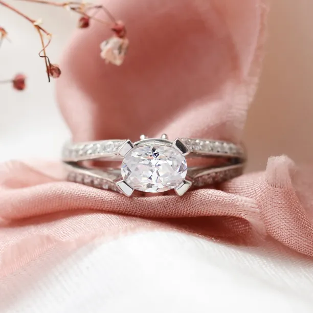 Engagement ring with moissanite and diamonds FITA Image