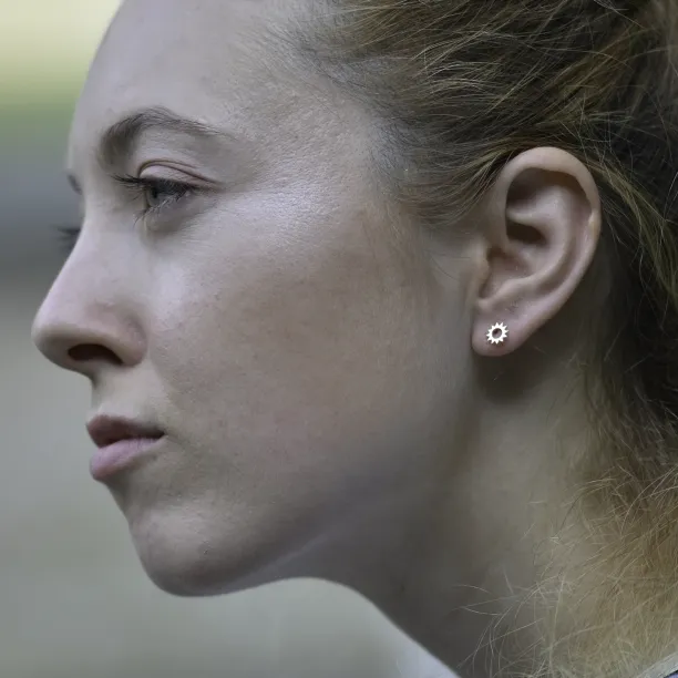 LOLLI unusual silver stud earrings for a striking lady Image