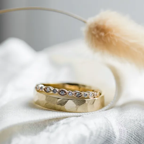 Gold diamond wedding rings LATI Image