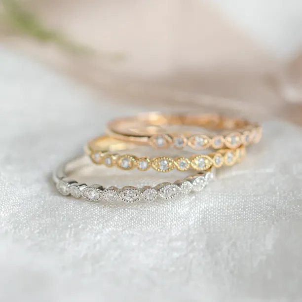 Gold diamond wedding rings LATI Image