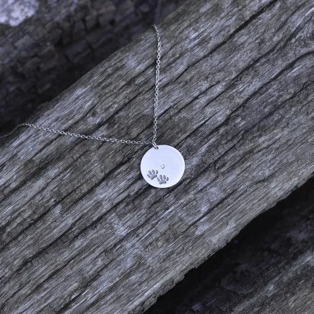 MORI golden pendant with dog traces Image