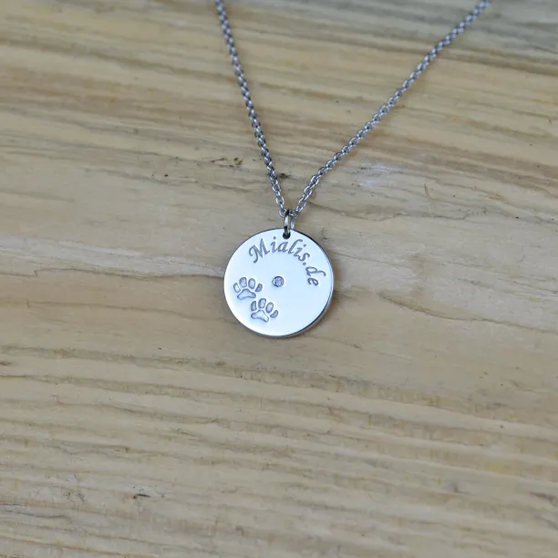 MORI golden pendant with dog traces Image