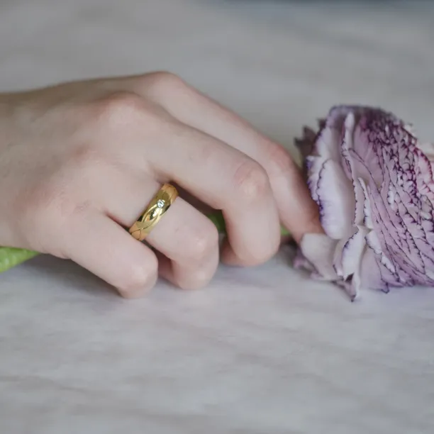 HERA gold diamond wedding rings Image