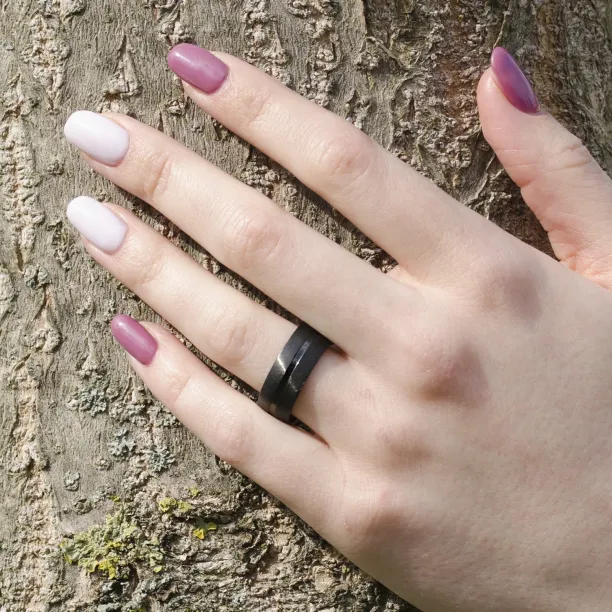 LENSVIK gold black ruthenium marriage rings Image