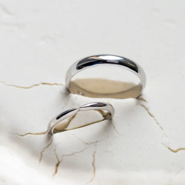 Gold wedding rings with bow tie shape LALI Image