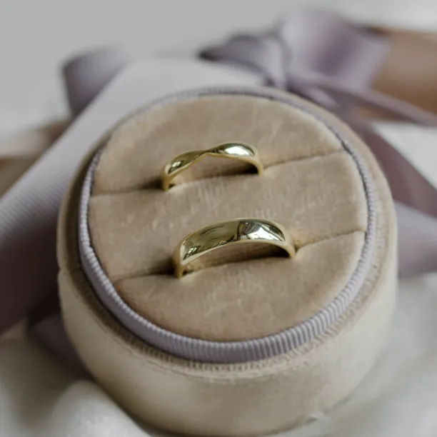 Gold wedding rings with bow tie shape LALI Image
