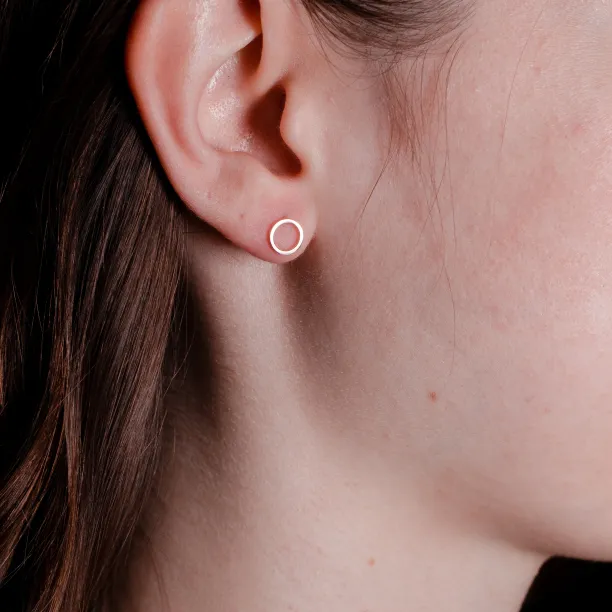 Gold karma earrings - ROLI Image