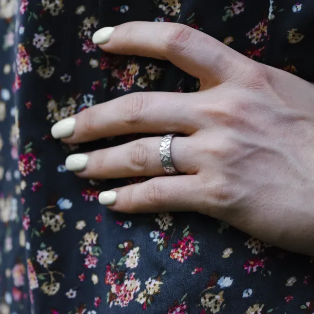 Gold wedding rings with a relief surface FIO Image