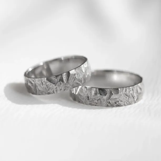 Gold wedding rings with a relief surface FIO Image