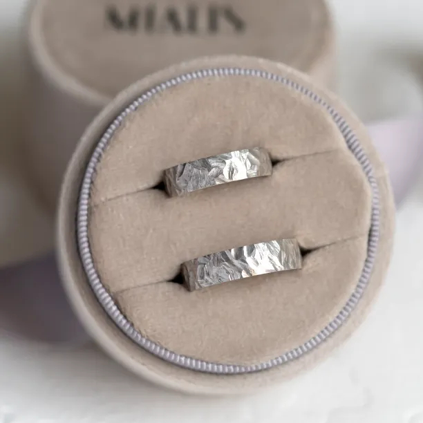 Gold wedding rings with a relief surface FIO Image