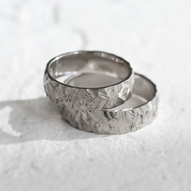 Gold wedding rings with a relief surface FIO Image