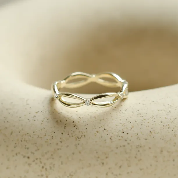 Gold diamond twisted ring ROMANCE Image