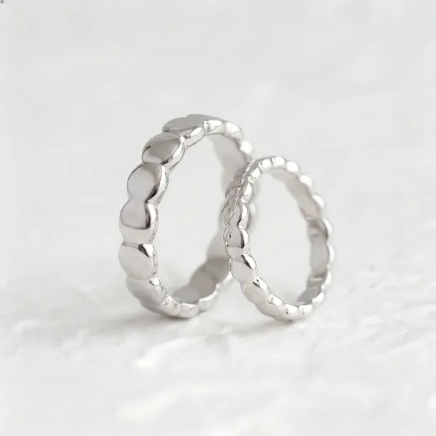 Geometric wedding rings with organic structure NOMA Image