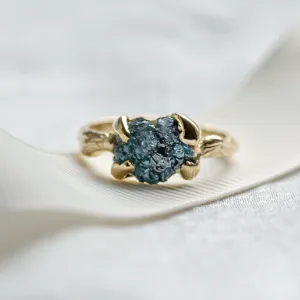Gold ring with blue raw diamond and unusual rim SKY
