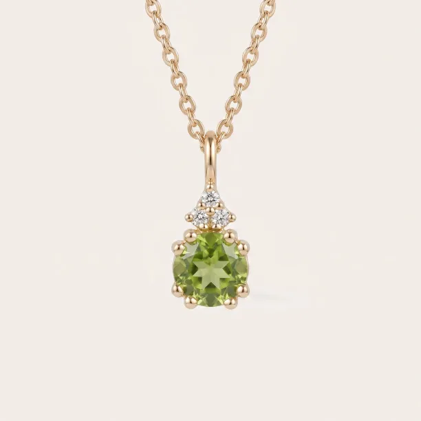 Gold peridot and diamond pendant VERT Image